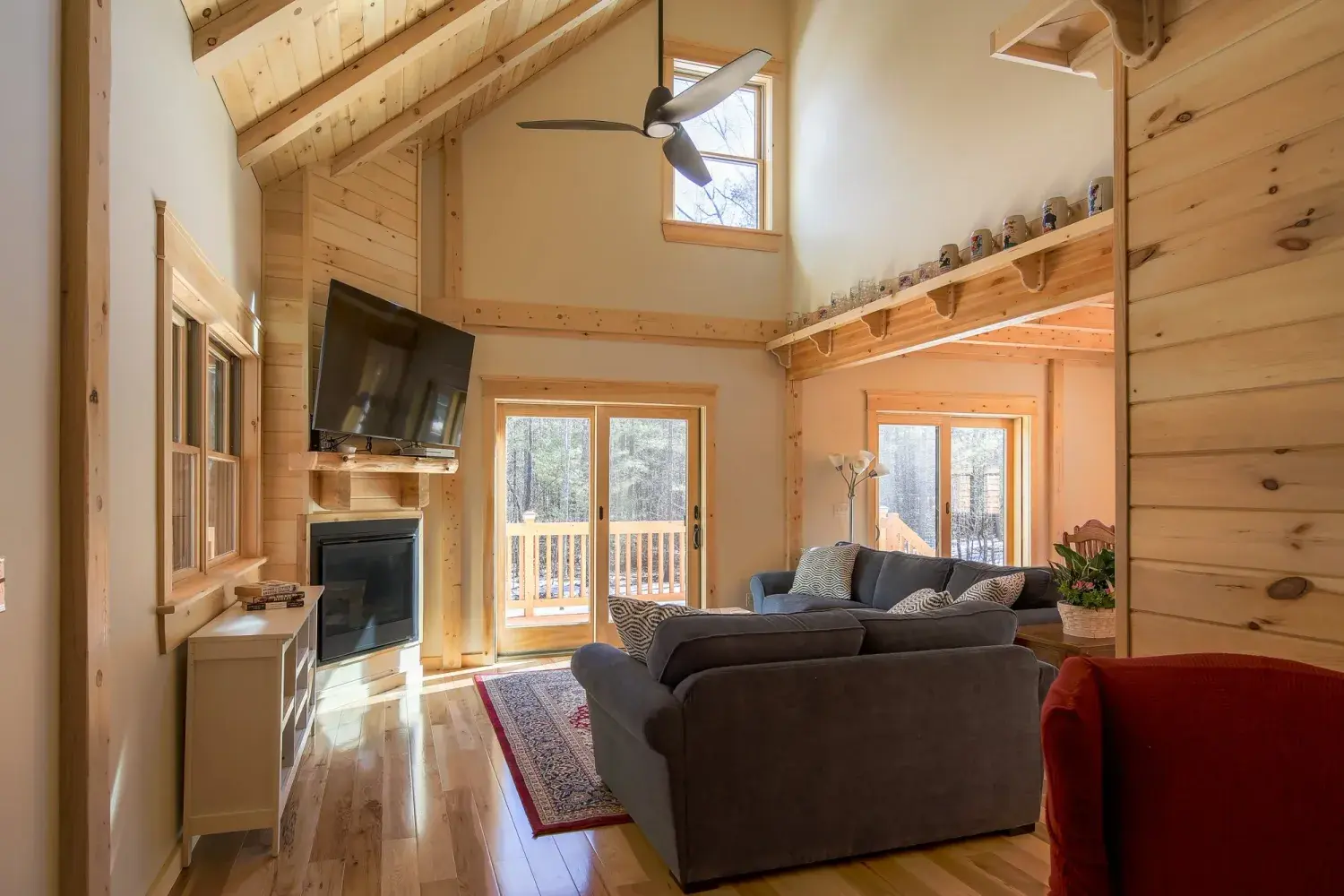 Cedar cottage living room with loft above