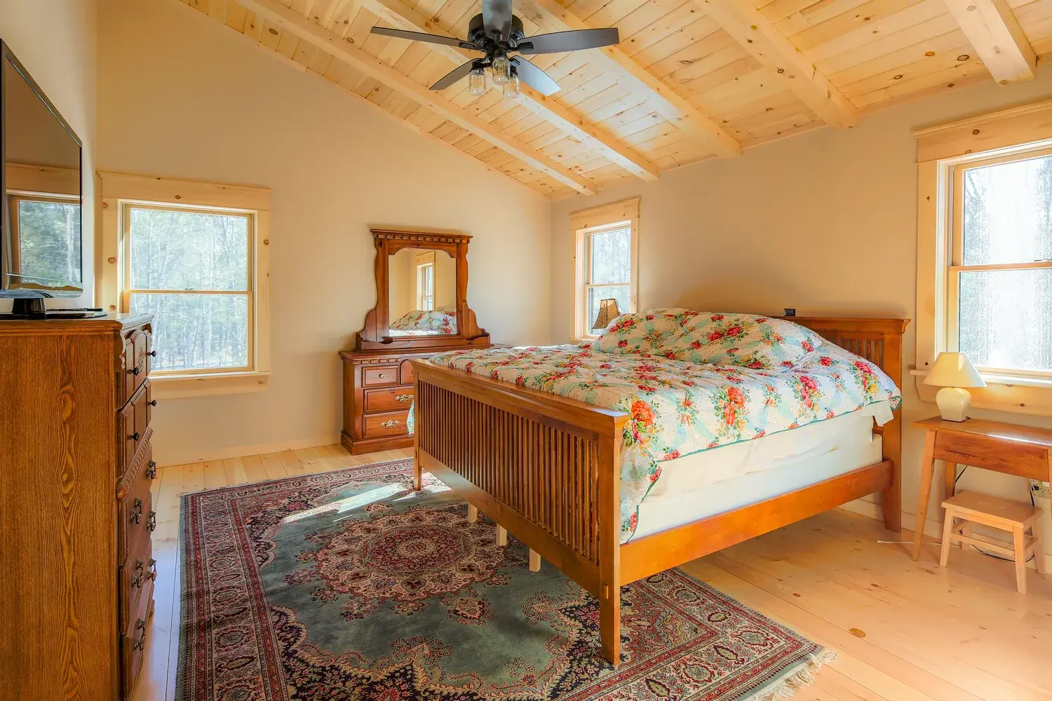 Cedar cottage bedroom with vaulted ceiling