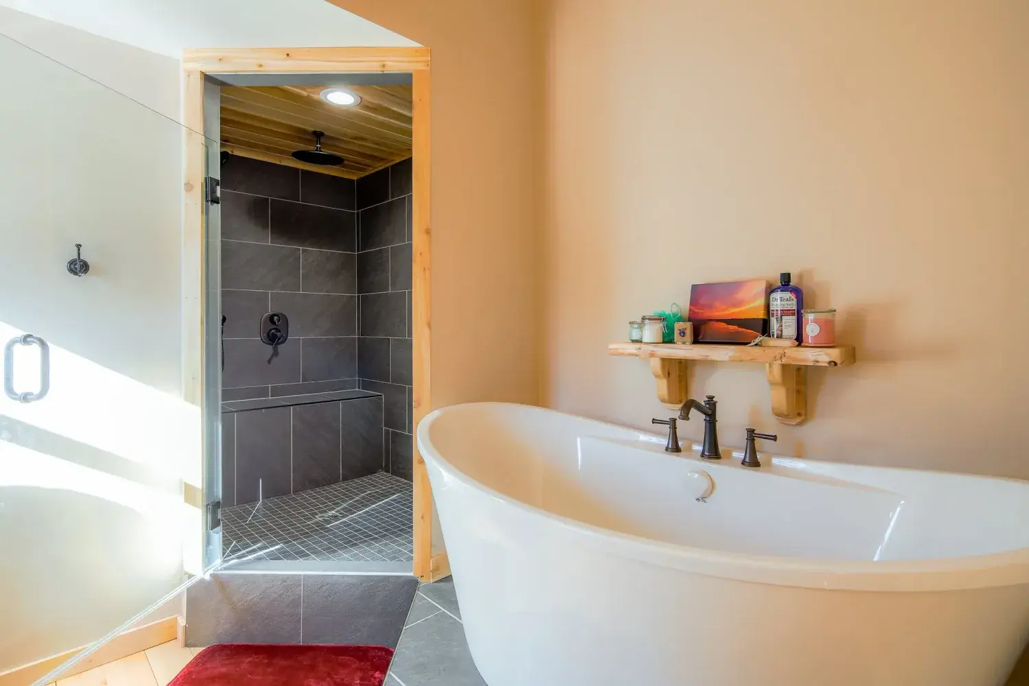 Cedar cottage bathroom with freestanding tub