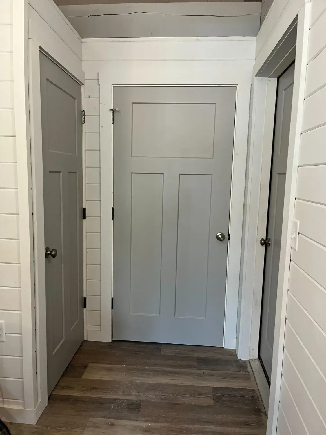 Hallway with interior doors