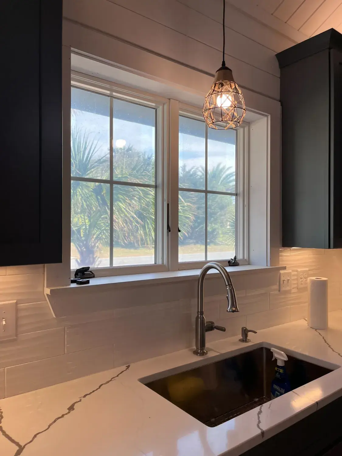 Kitchen sink under windows