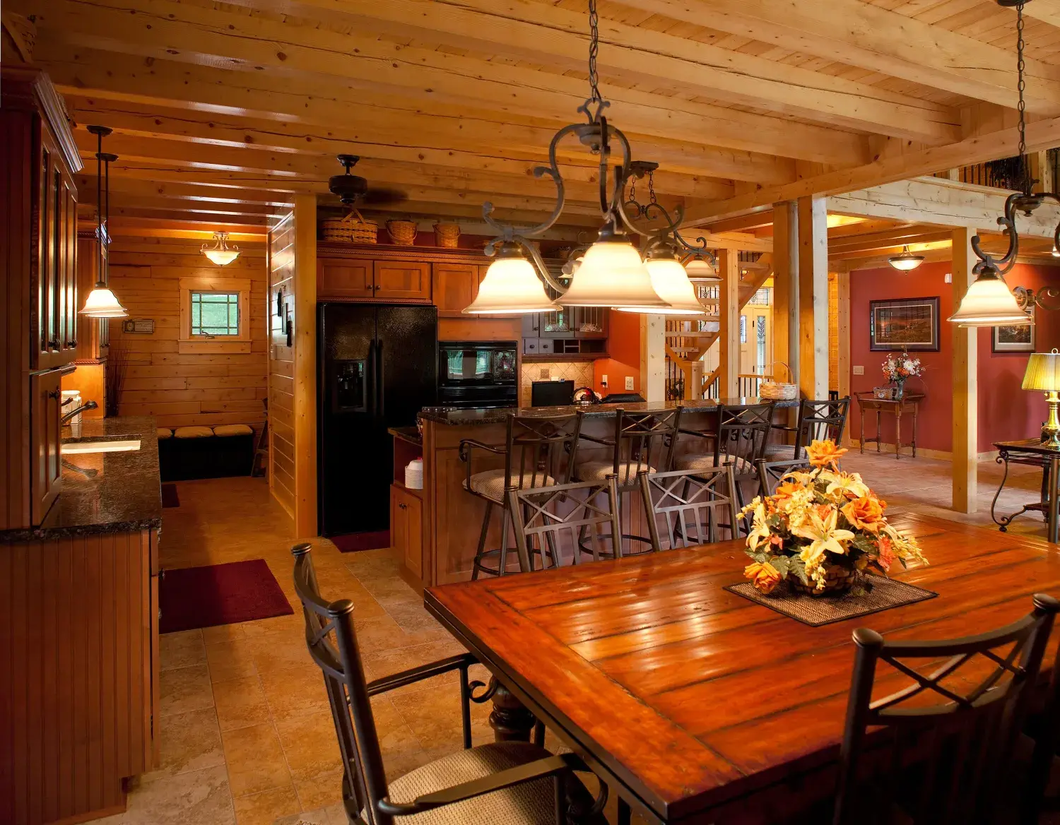 Cedar kitchen and dining area with pendant lights