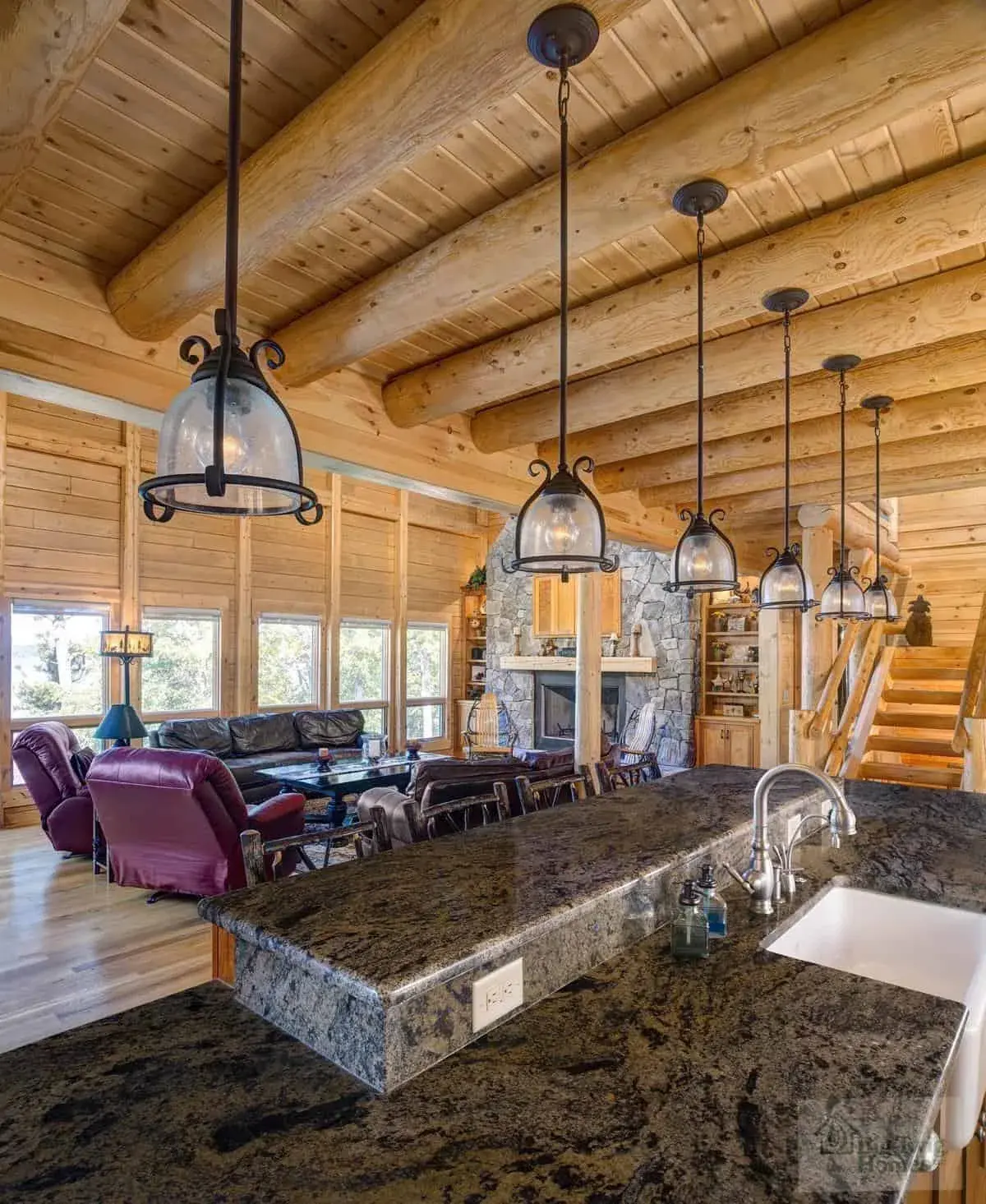 Big Twig Homes LLC. Beautiful cedar log home in the mountains. picture of the kitchen area. Big Twig Homes LLC. is a dealer of high quality cedar log homes, sell log home packages and log home kits, serving the Southeastern United States including North Carolina, South Carolina, Georgia, and Tennessee.