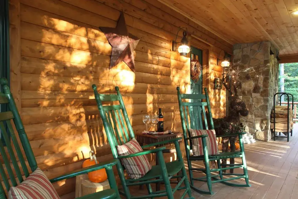 Modified Senator 07706 cedar log home porch