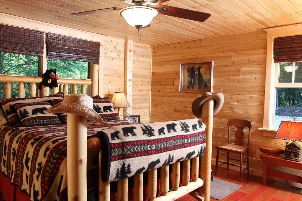 Modified Senator 07706 cedar log home bedroom