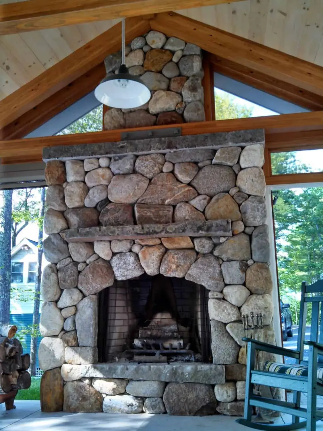 closeup of outdoor fireplace in sunroom