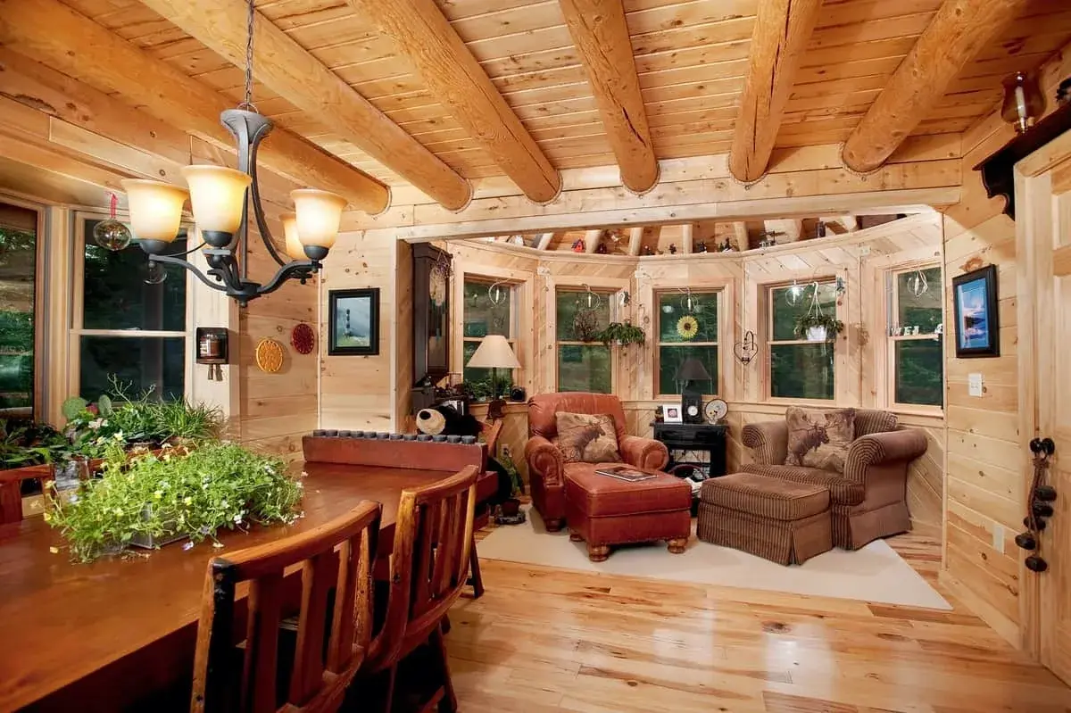 Big Twig Homes LLC. Log home with breakfast nook. this was designed and built by Big Twig Homes. Contact Big Twig Homes for your next log home. we offer cedar log home packages.