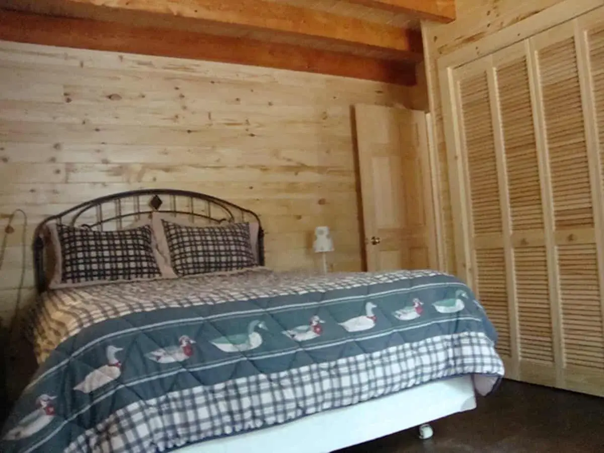 The bedroom in the Peacock home.