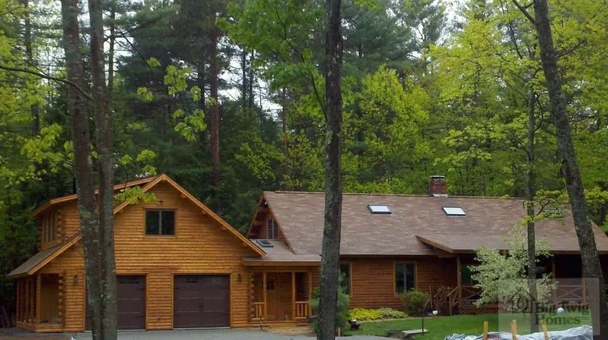 A view of the garage on a log home.