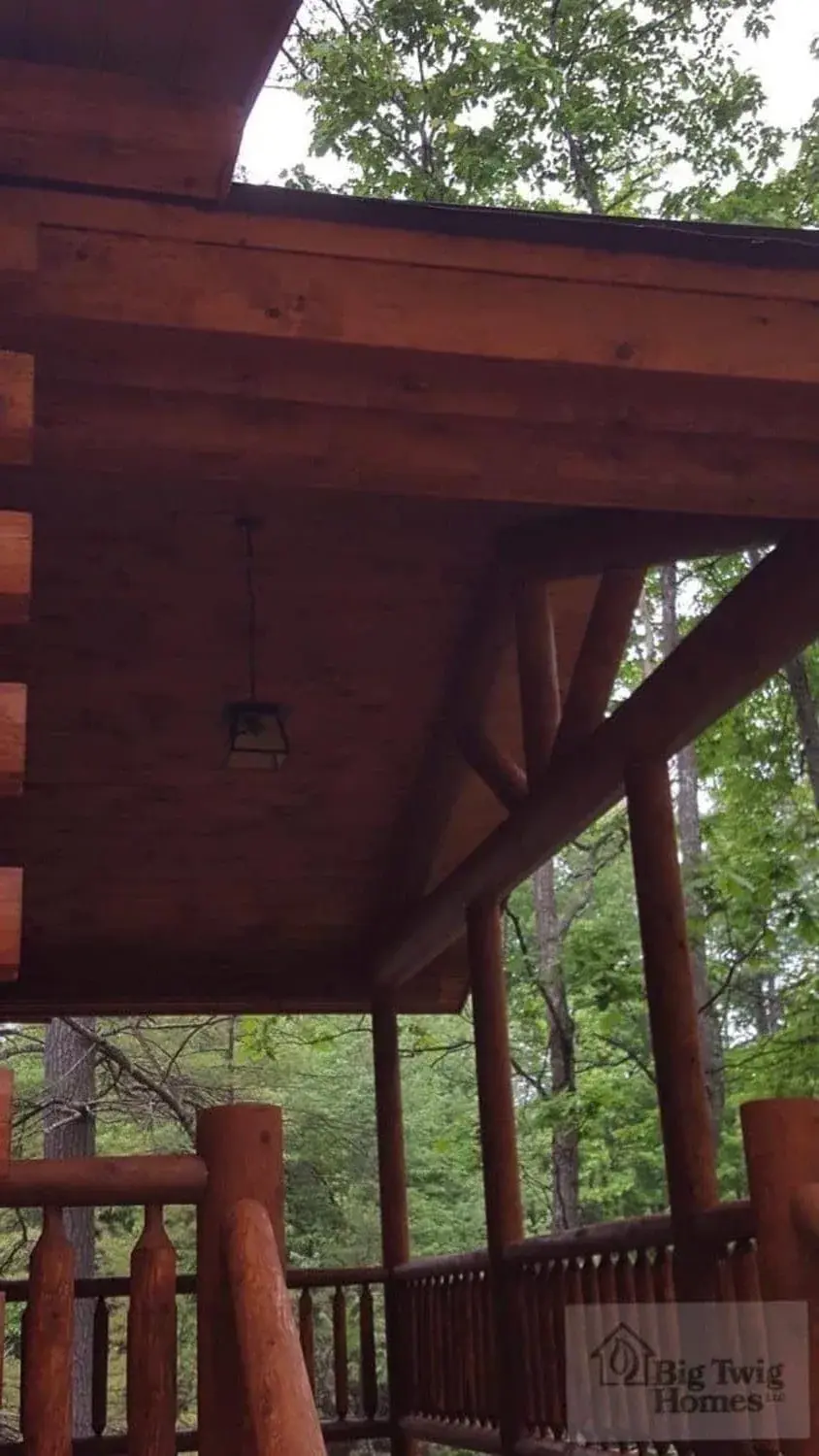 Details of the front porch on a log home.
