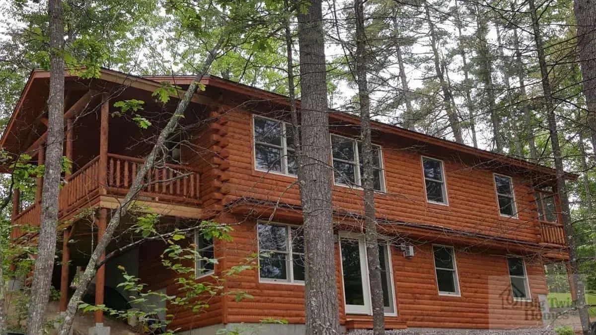 A two story log home built by Big Twig.