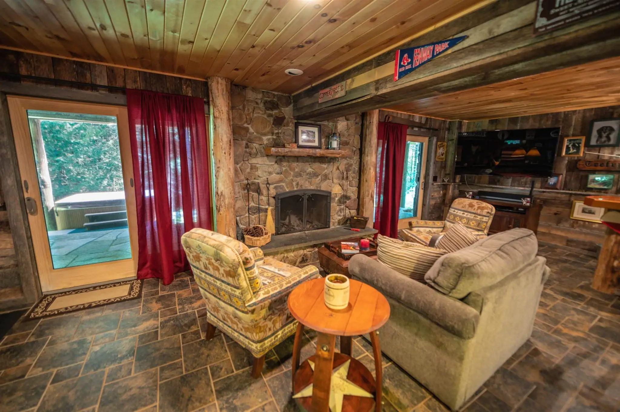 A cozy sitting area connects the game room to the outside entrance, with a hot tub just a few steps from the door. 