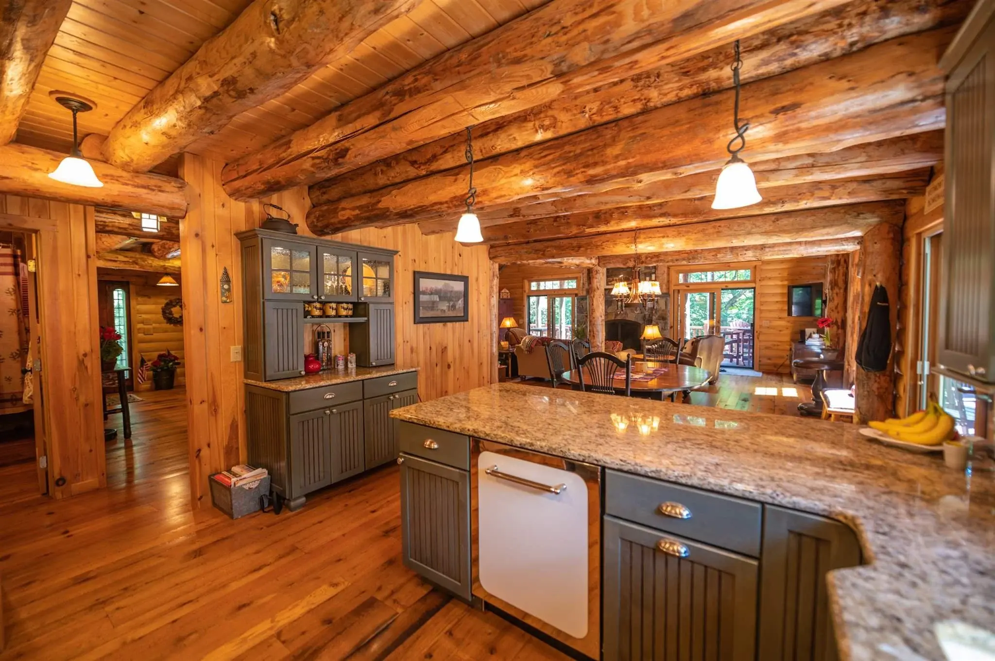 A dedicated dining area along with countertop seating offers flexibility and a natural connection between the living room and kitchen. 
