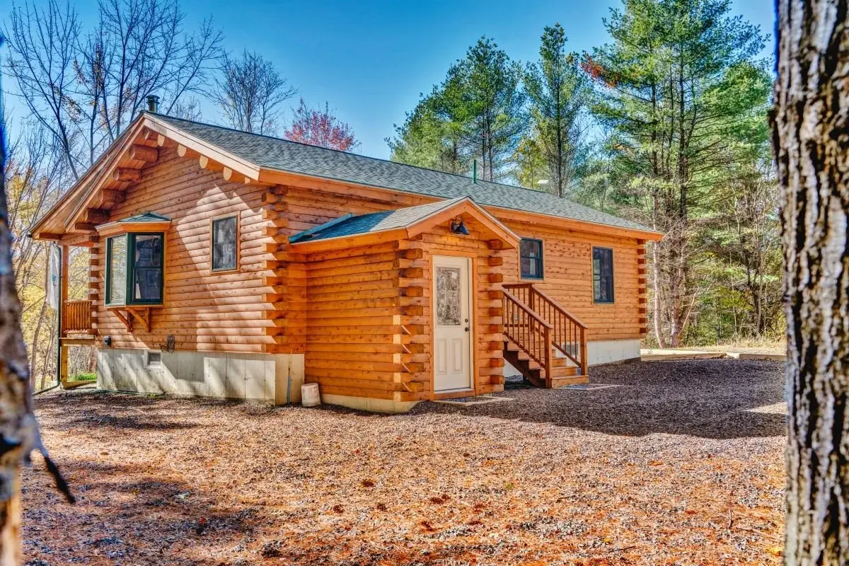 This version of the Milo includes a finished basement, complete with exterior access from the main level. The stairs beyond open onto the first floor, and are perfectly positioned for a future patio off the kitchen. To the left, a bay window floods t