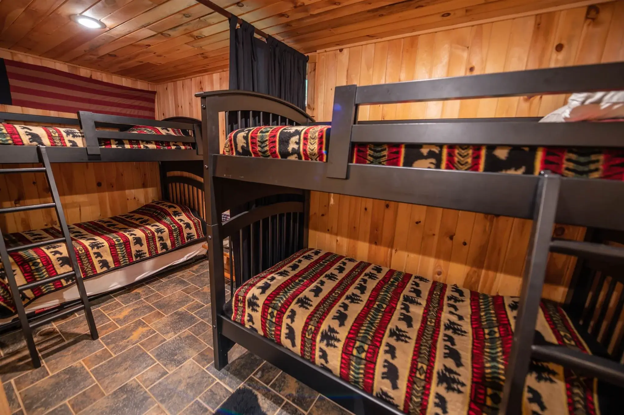 A double bunk room on the ground floor offers extra guest space, adding even more flexibility. 