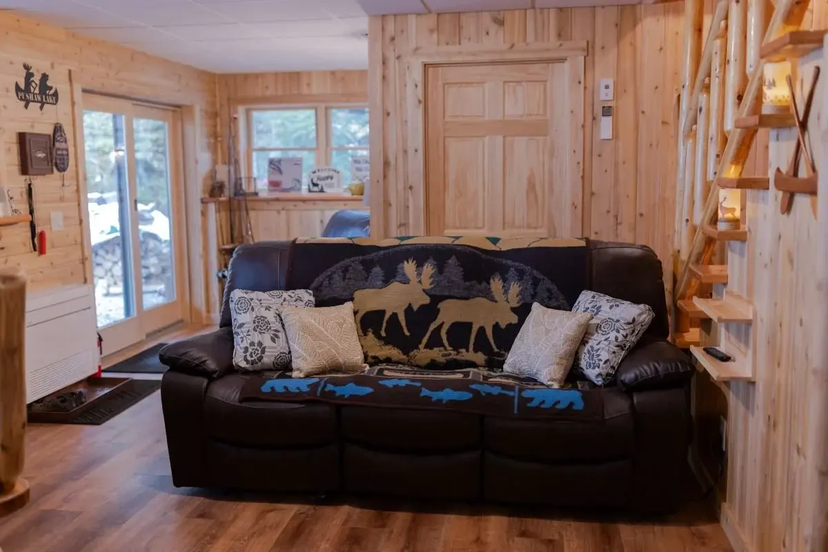 The walkout basement features a spacious ‘drop zone’ just inside the sliding glass doors, and is the perfect spot for a small sitting area. 