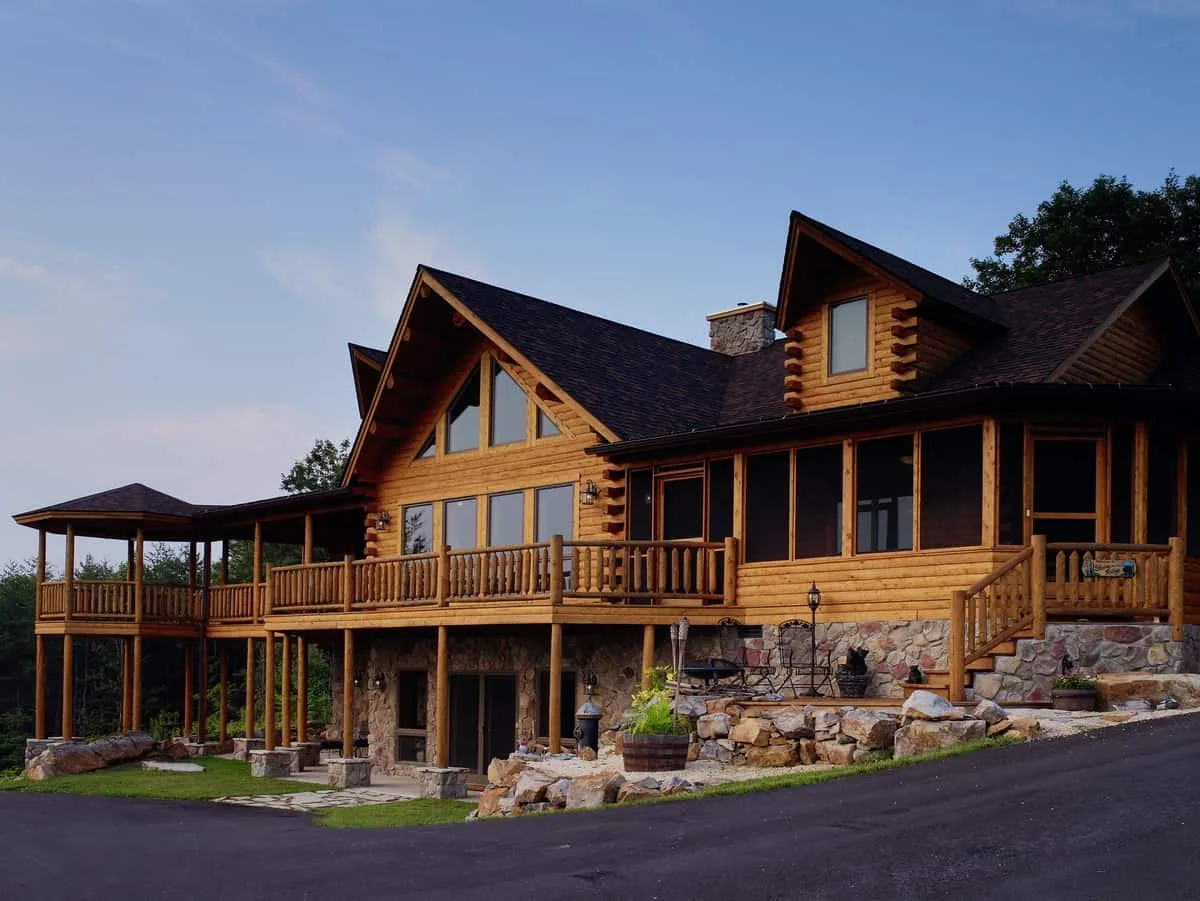 Big Twig Homes LLC. Beautiful cedar log home in the mountains. picture of the exterior of the home. Big Twig Homes LLC. is a dealer of high quality cedar log homes, sell log home packages and log home kits, serving the Southeastern United States including North Carolina, South Carolina, Georgia, and Tennessee.