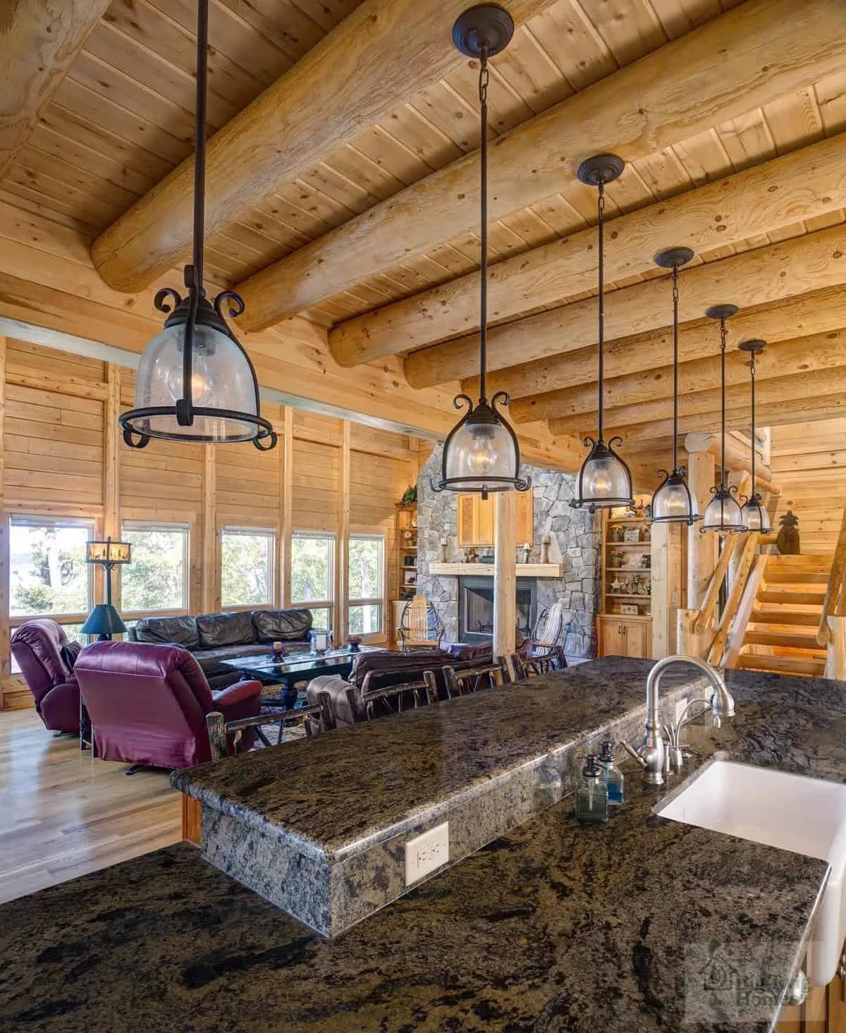 Big Twig Homes LLC. Beautiful cedar log home in the mountains. picture of the kitchen area. Big Twig Homes LLC. is a dealer of high quality cedar log homes, sell log home packages and log home kits, serving the Southeastern United States including North Carolina, South Carolina, Georgia, and Tennessee.
