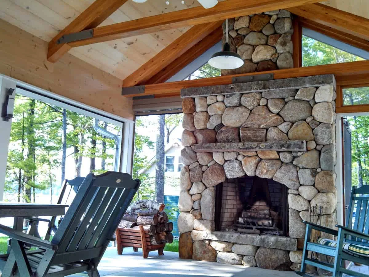 outdoor fireplace in sunroom