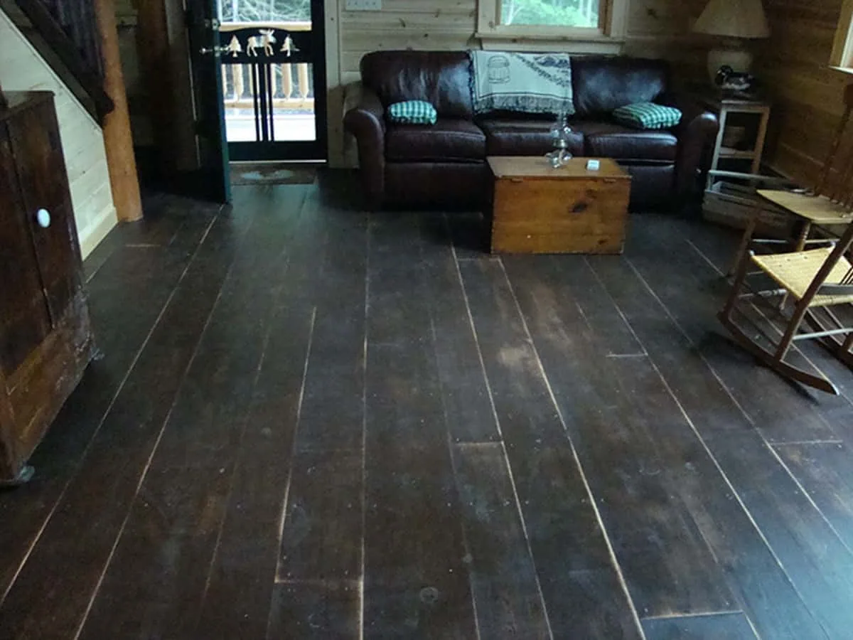 Wide plank wood flooring.