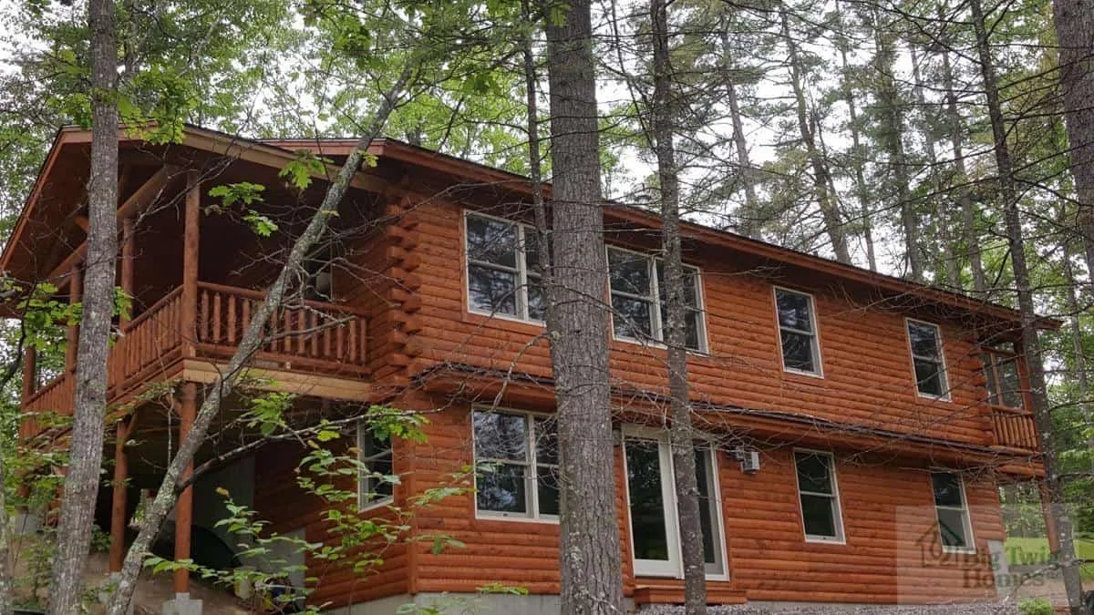 A two story log home built by Big Twig.