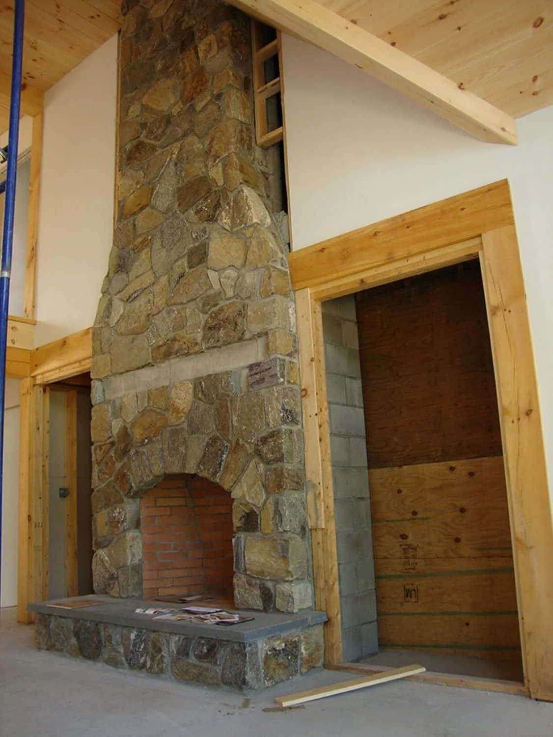 A handcrafted stone fireplace.