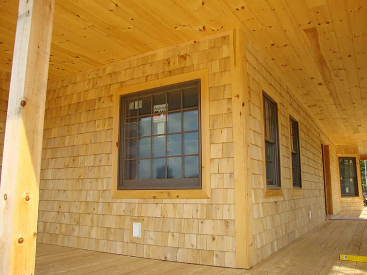 A closeup image of cedar shingle siding.